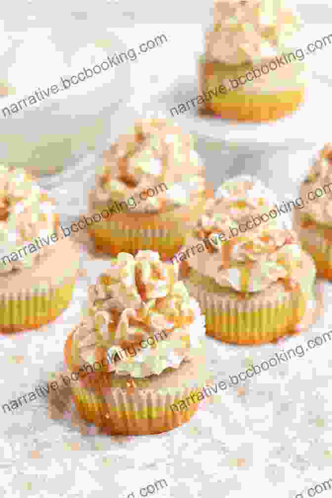 A Cupcake With Salted Caramel Frosting And A Caramel Drizzle Easy Cupcake Cookbook (Cupcakes Cupcake Cookbook Cupcake Recipes Cupcake Ideas Cupcake Cakes Easy Cupcakes 1)