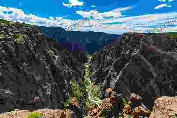 A Panoramic View Of Black Canyon National Park, Colorado, Showcasing Its Rugged Cliffs And The Gunnison River. Murder In Black Canyon (The Ranger Brigade: Family Secrets 1)
