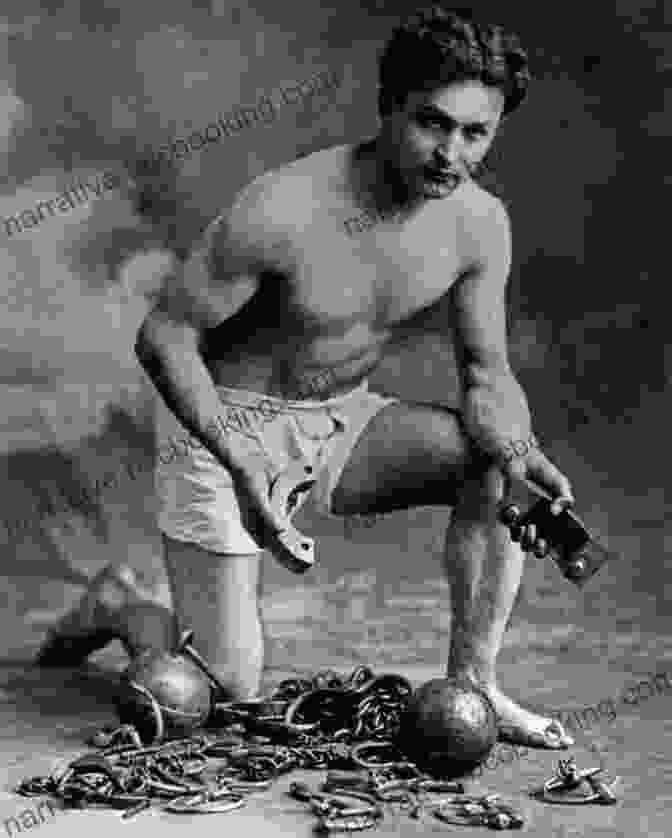 A Vintage Portrait Of Harry Houdini In His Iconic Pose, Handcuffed And Wearing His Signature Straitjacket American Legends: The Life Of Harry Houdini