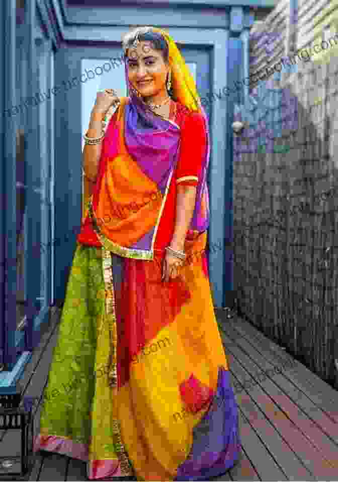 A Woman Wearing A Traditional Rajasthani Dress In Vibrant Colors Patterns Of India: A Journey Through Colors Textiles And The Vibrancy Of Rajasthan