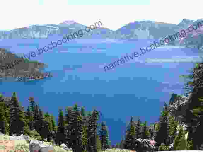 The Vibrant Blue Waters Of Crater Lake, Nestled Amidst The Rugged Mountains Of Oregon Northern California Oregon And The Sandwich Islands